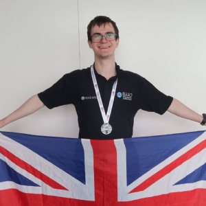 Student George D with his World Silver Medal from the International Olympiad on Astronomy and Astrophysics